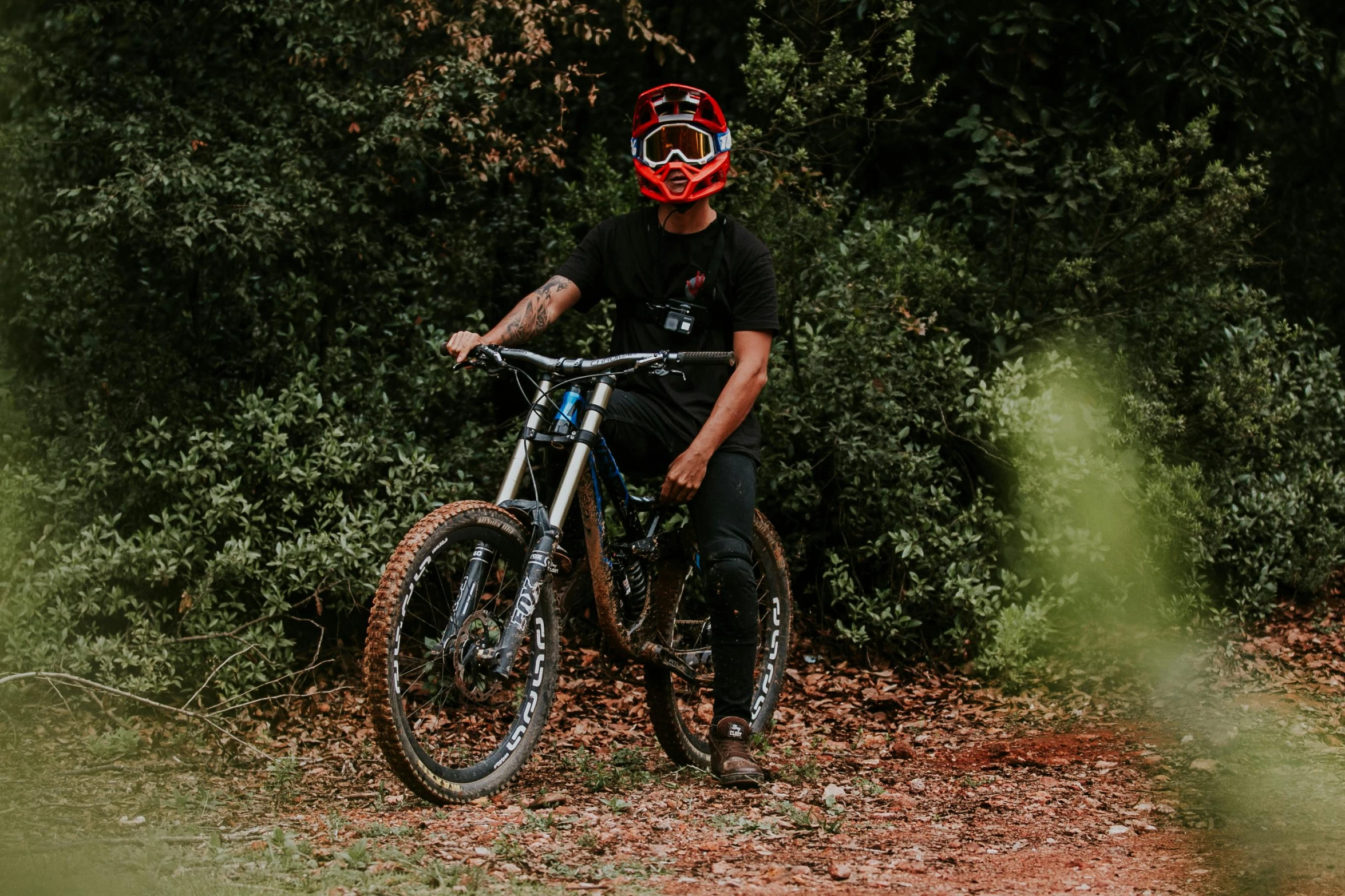 there is a young person on his mountain bike