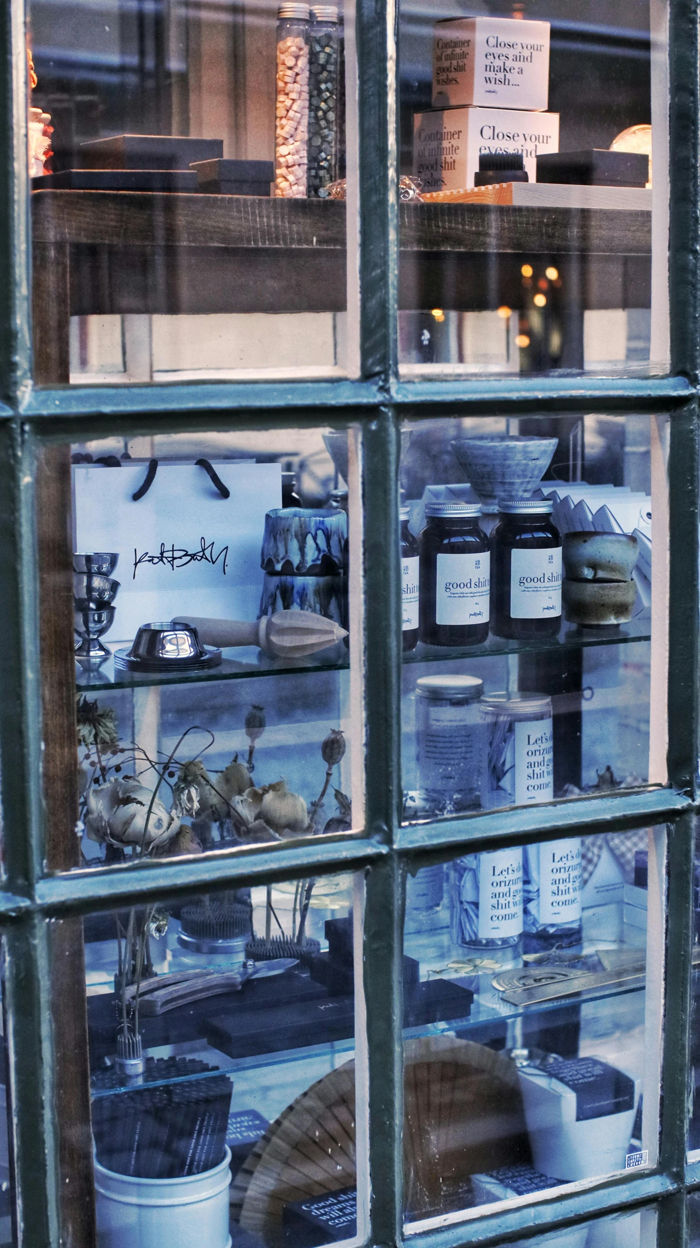 looking outside at the past shop window in a rural town