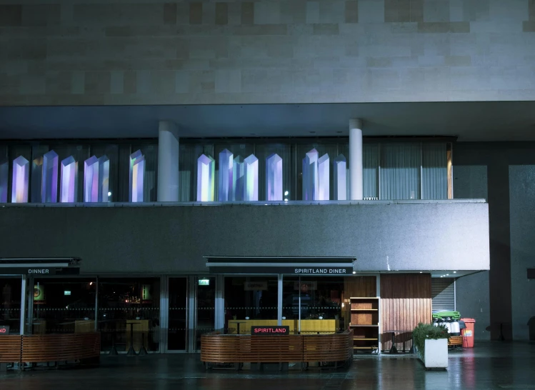 an indoor shop that has a lot of glass