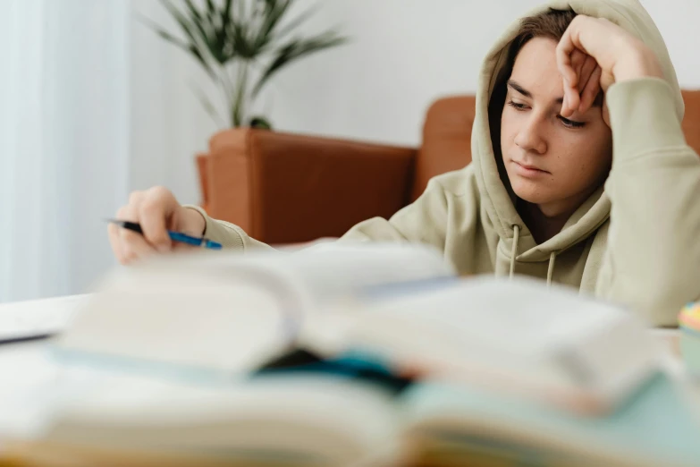 the woman is working on her homework