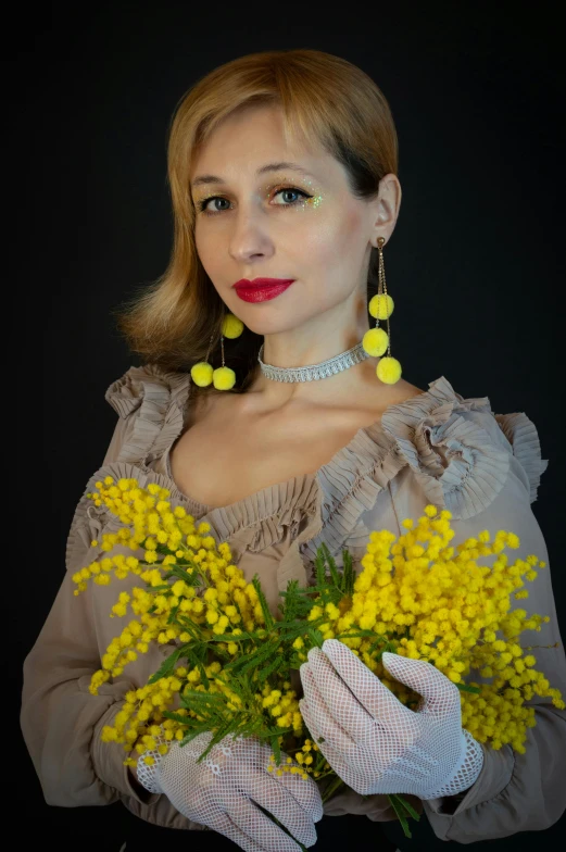 woman with a bouquet of yellow flowers