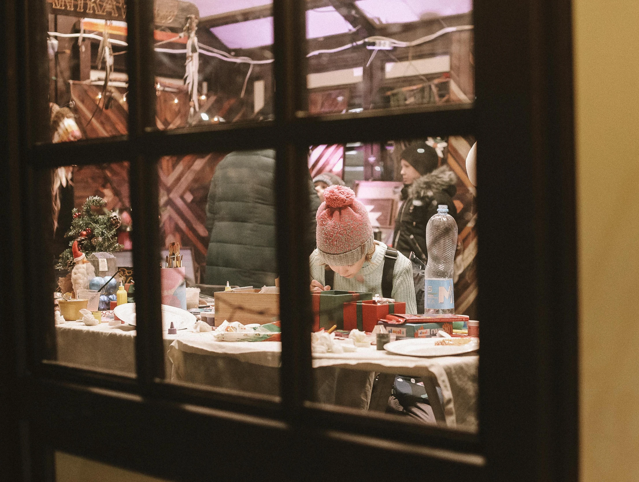 view through glass of a table in front of a mirror