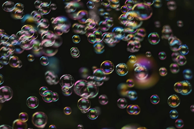 soap bubbles that have a lot of colorful bubbles