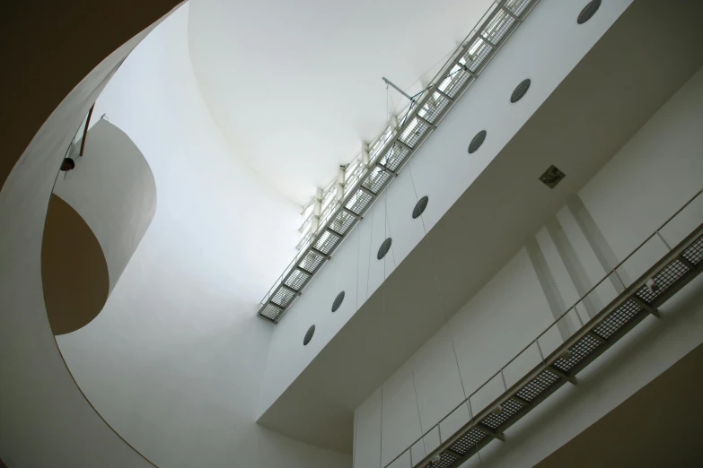 a staircase leading up to a very tall building