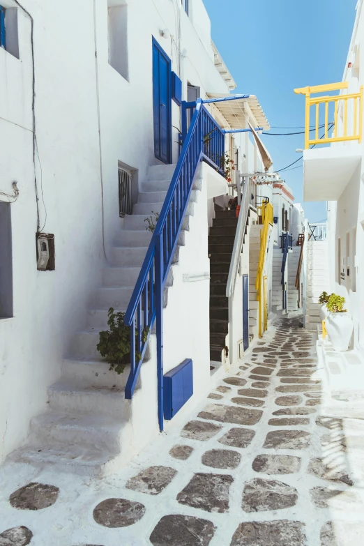 the blue and yellow stairs lead to various small rooms