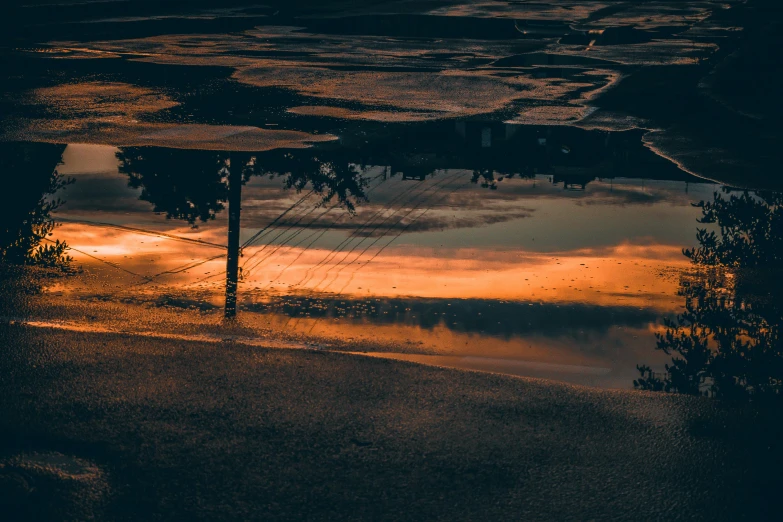 street signs with light in the reflection of the sky