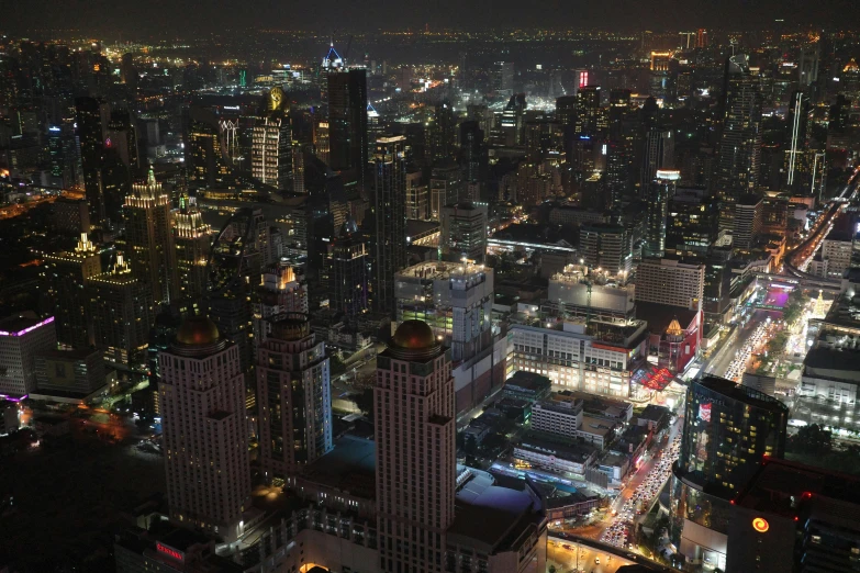 a large city is lit up at night