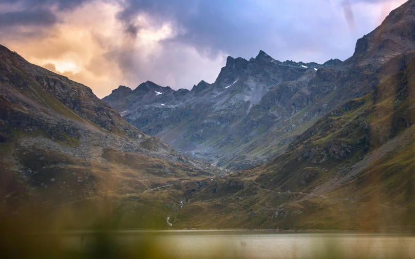 the mountains surrounding a body of water