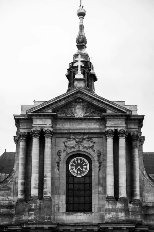 an old clock tower at the top of a building