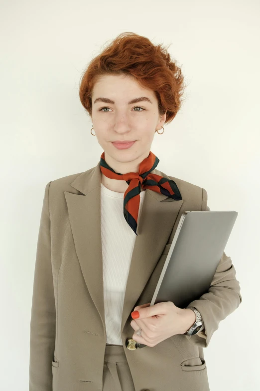 a woman with a red bow tie is posing for a picture