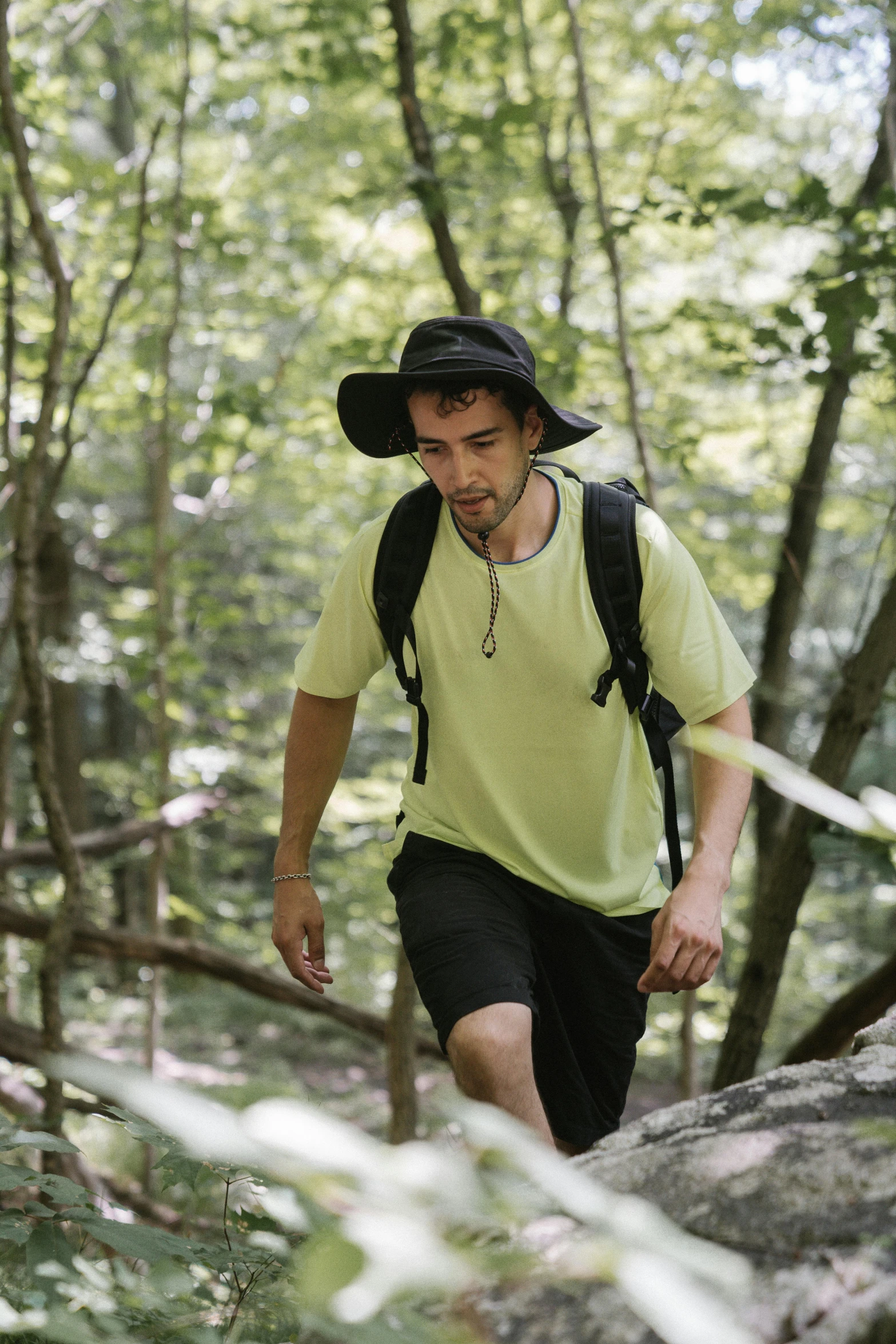 a person walks through some tall woods