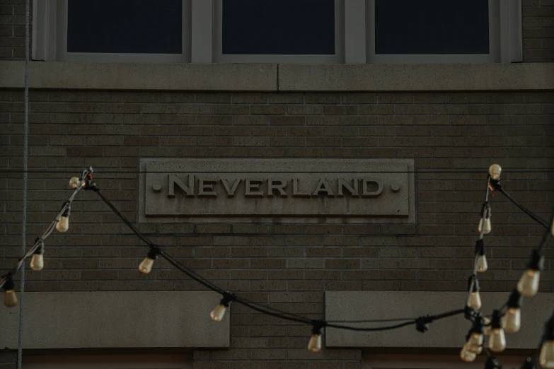 the name neverland on a brick building
