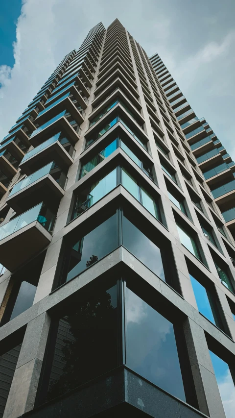 the top of the building is high with lots of windows