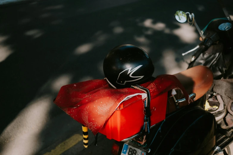 the seat is black and the helmet and seat are red