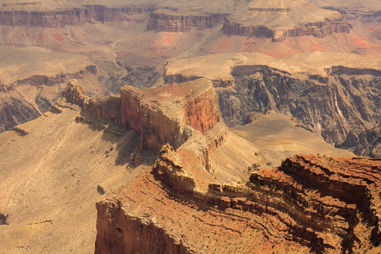 the grand canyon is majestically massive and is part of the grand canyon national park