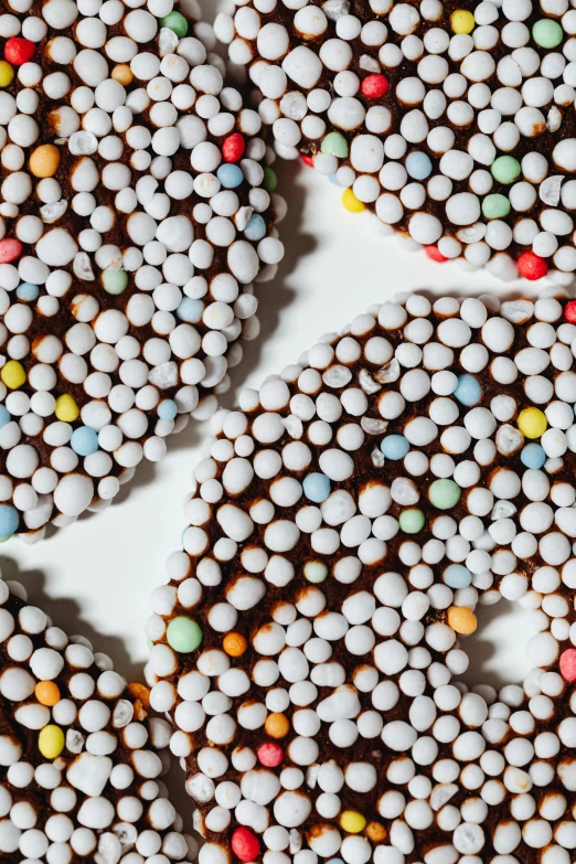 close up po of a chocolate cake made of cookies with icing