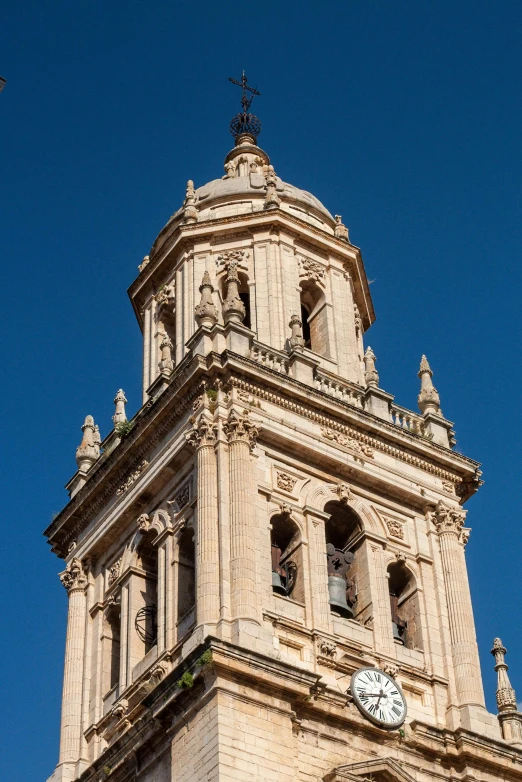 a clock on a tower with an upper floor and second floor