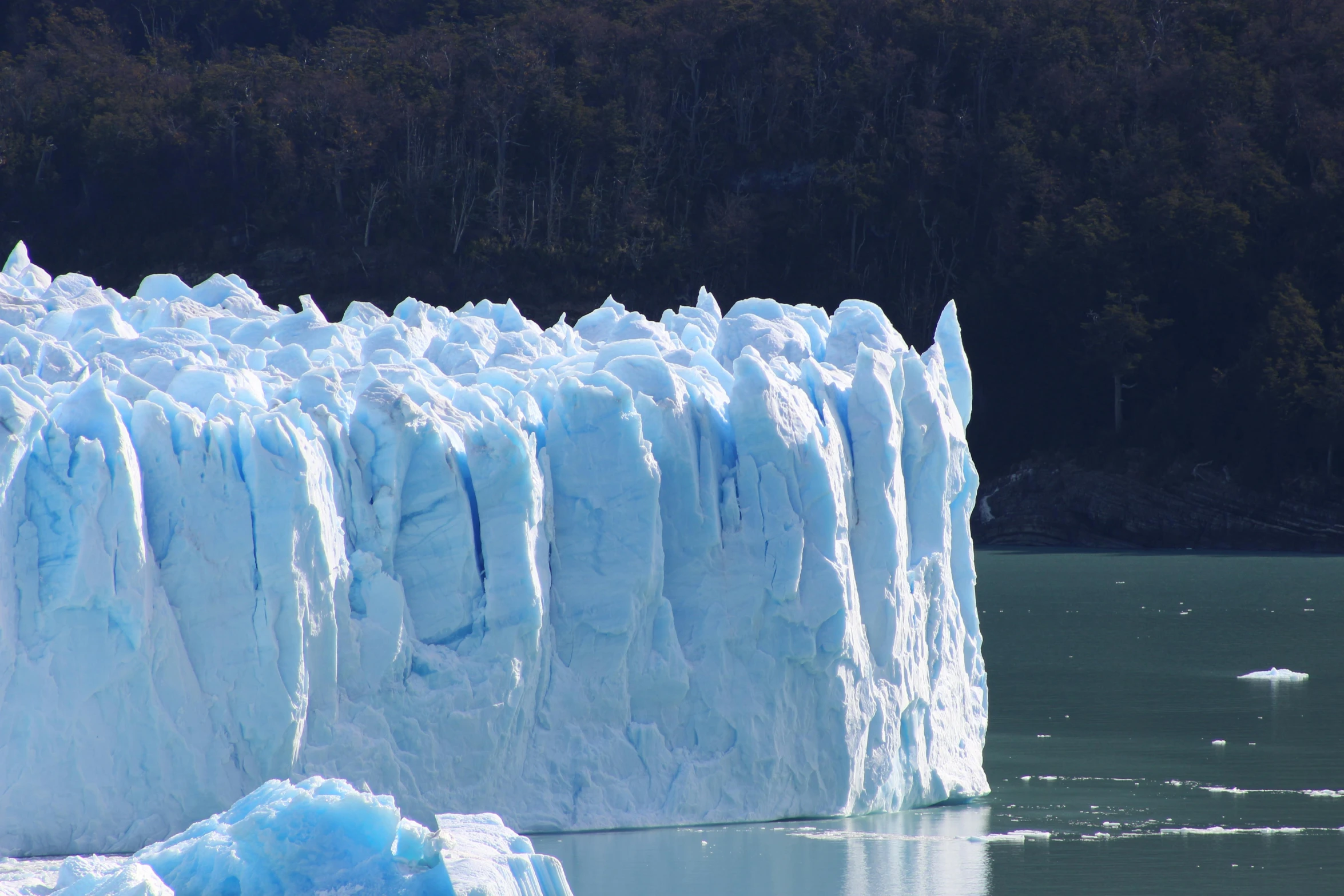 a large ice formation at an icefield near water