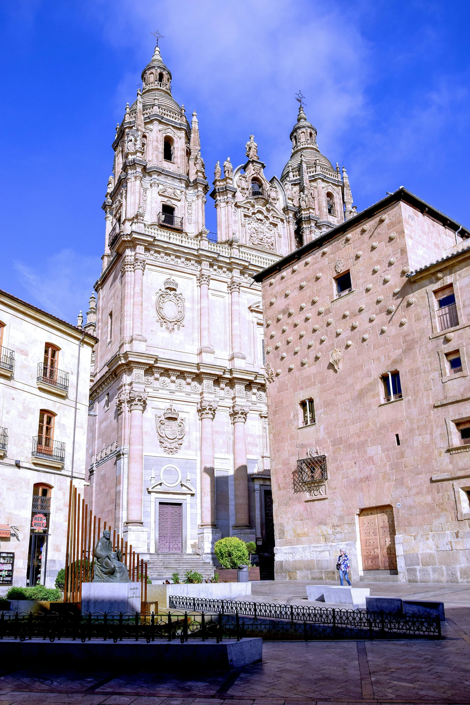 some buildings and two people on the ground