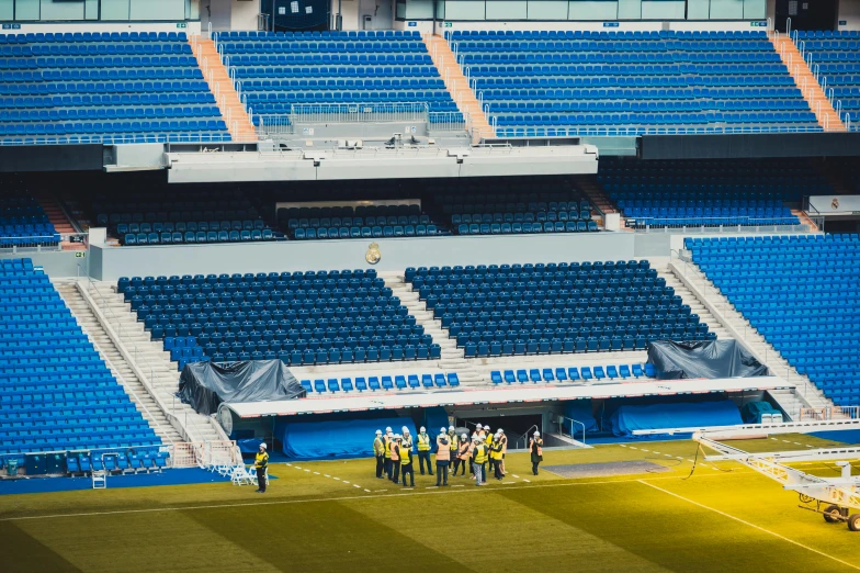 the team is gathered in the stadium for a game