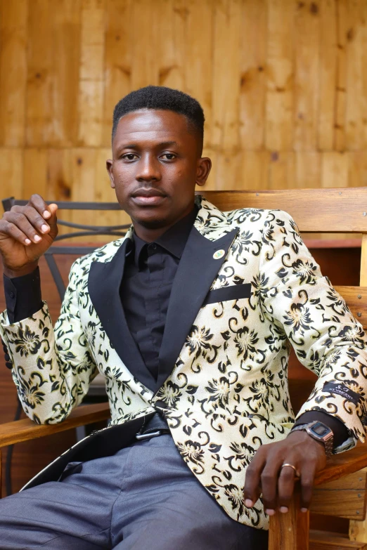 man sitting on bench with suit and tie on