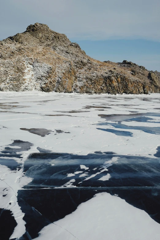 the view shows snow, ice and mountains