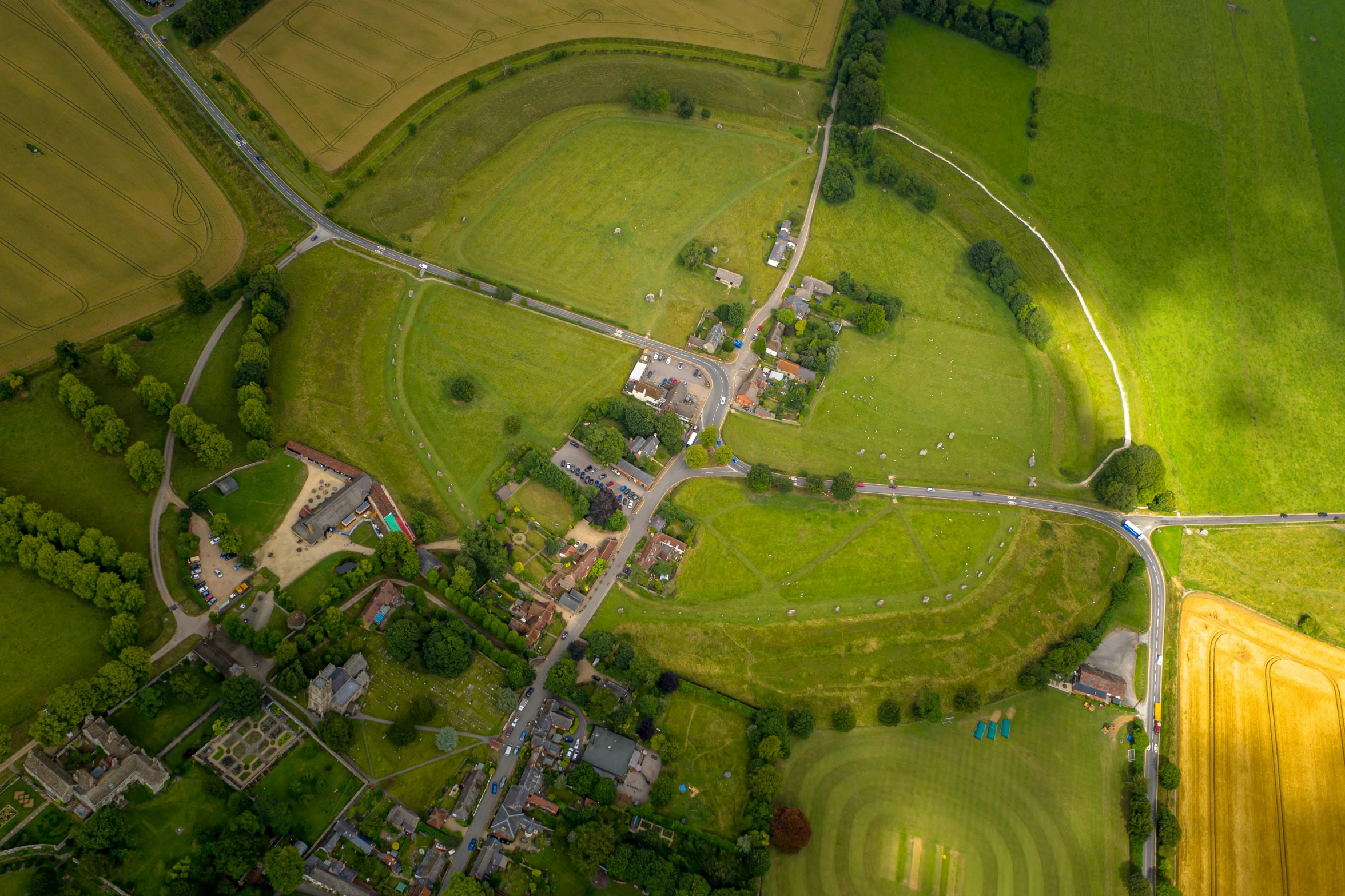 an aerial view of a grassy, rural countryside