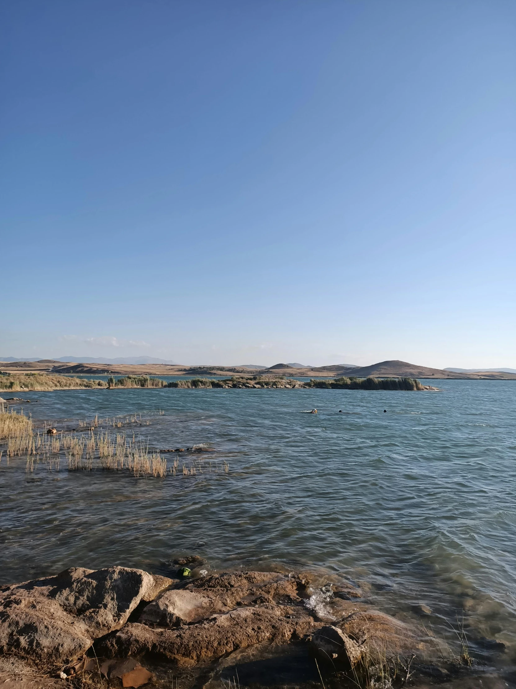 a body of water that is empty with land and water