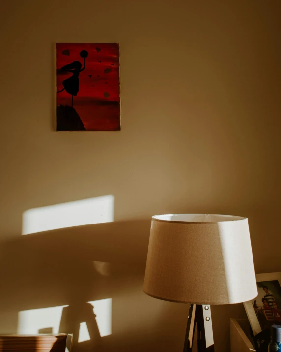 a lamp is shown in a very dimly lit room