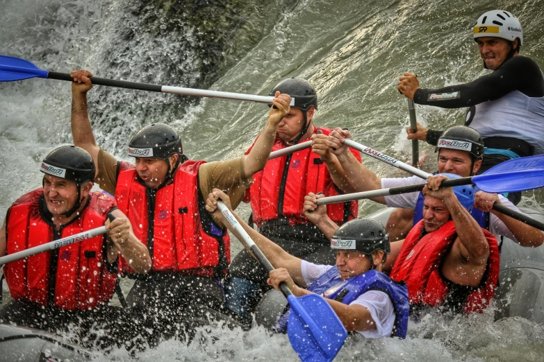 a group of people that are in a kayak