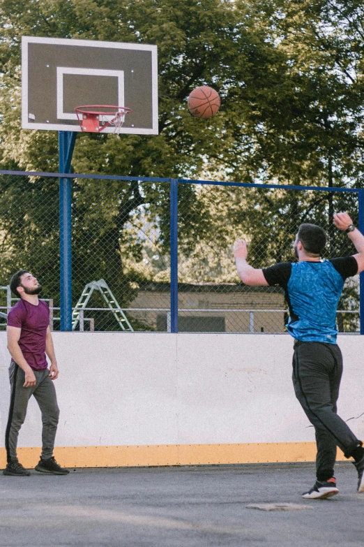 a man is playing basketball on the court