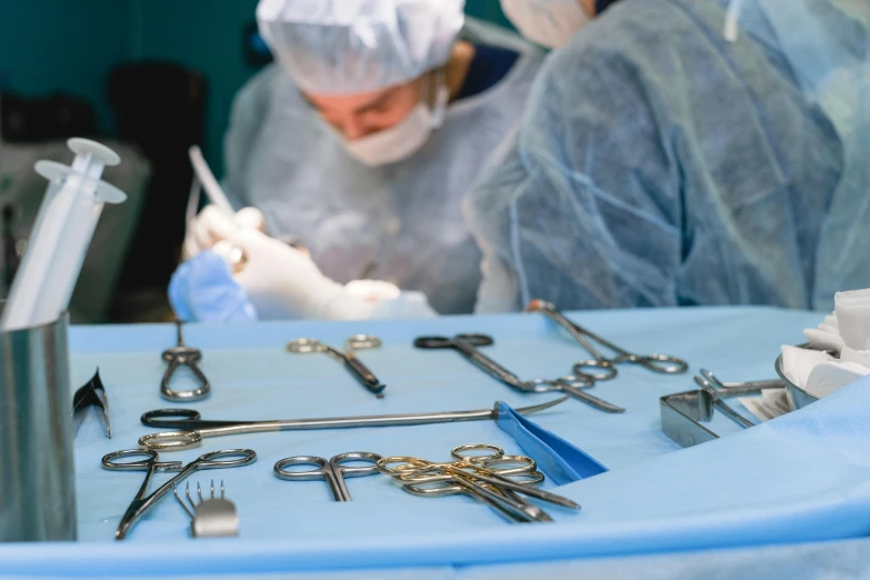 the two people are doing soing in their surgical room