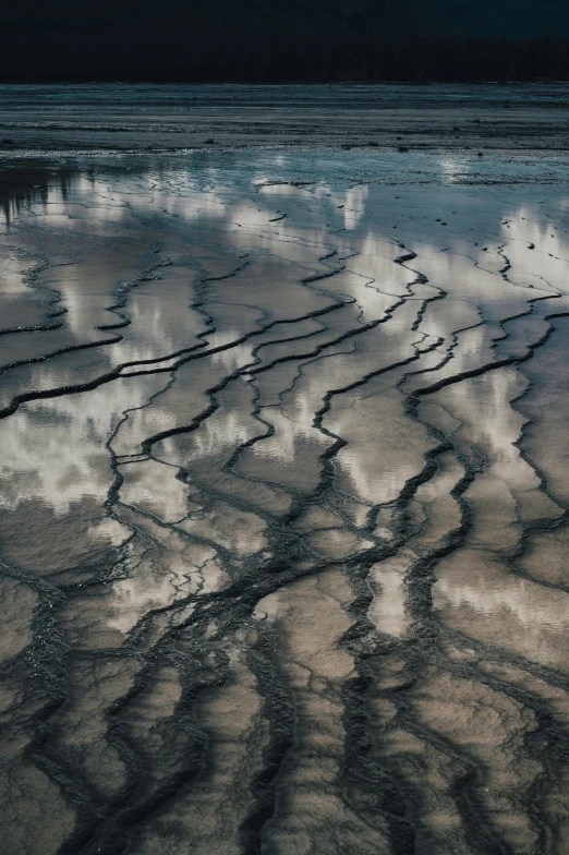 the tide breaks off the rock by the ocean