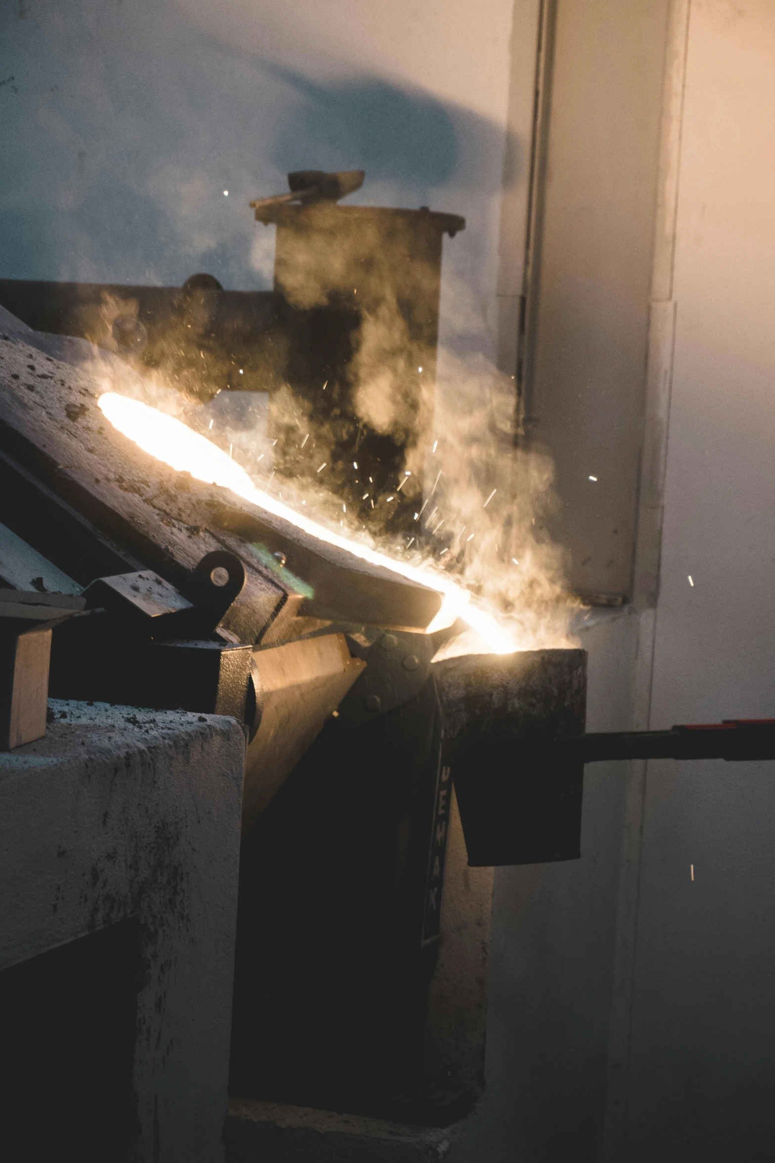 a black and white image of soing making fire