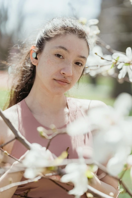 an image of a girl in bloom in a flowered park