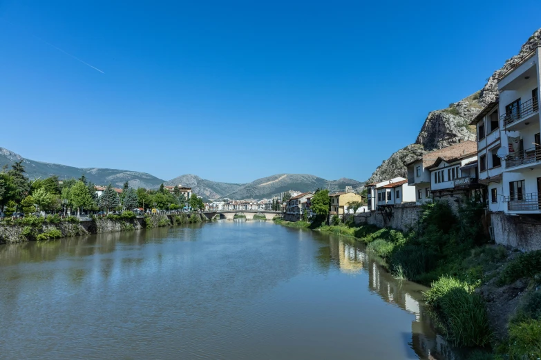 a lake sits in front of a town