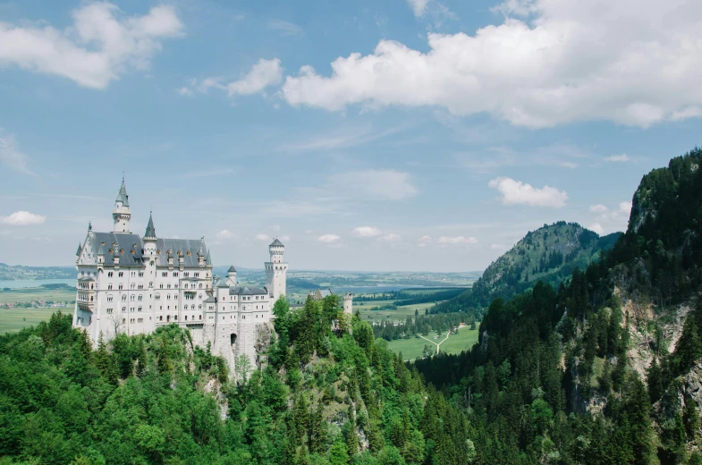 an image of a building on a hill