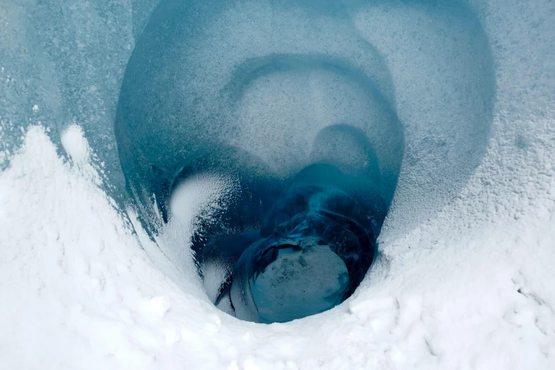 a water source with snow around it