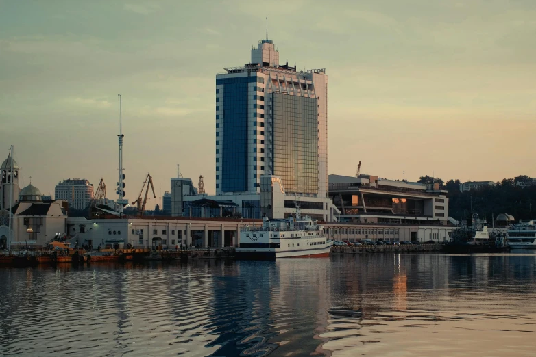 an ocean and cityscape in the background