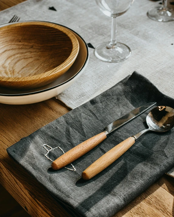 an image of the table setting for two