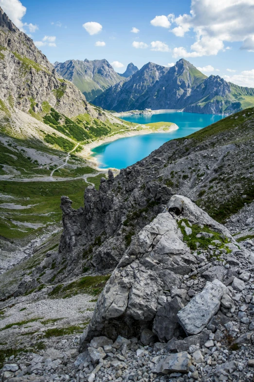 the rocks and gravel is at the top of a hill