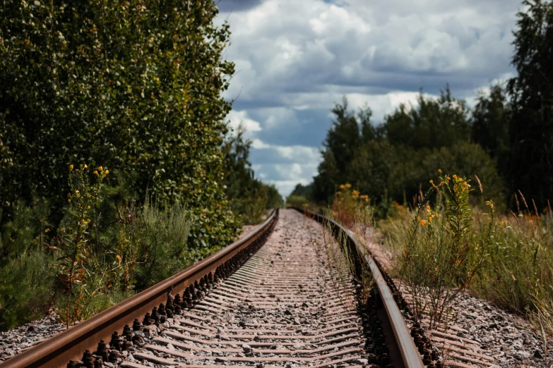 the old railroad tracks have been worn down with wear