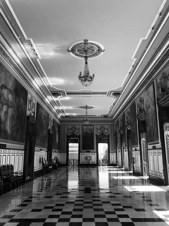 a black and white po of the ceiling in an old palace