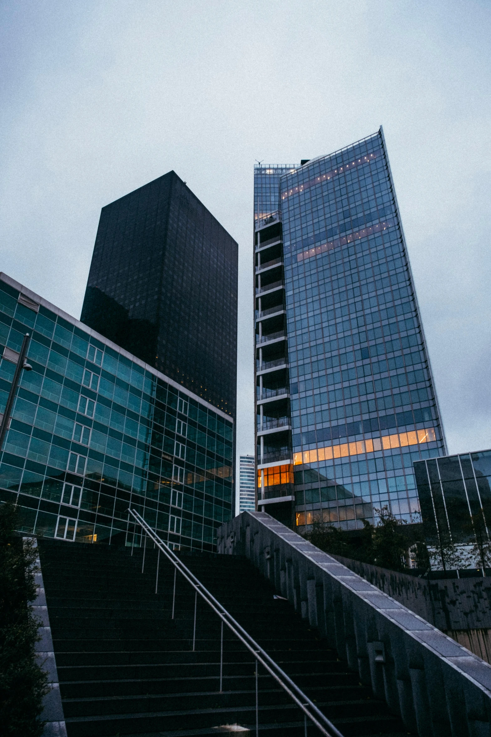 the stairs are going up to the skyway in the city