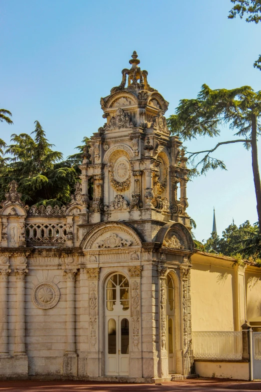 a very nice building with an ornate clock tower