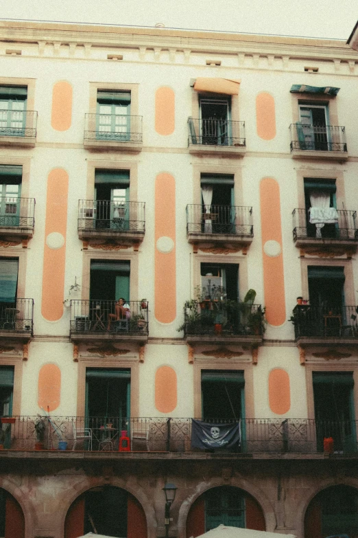 a building with multiple balconies on the balconies