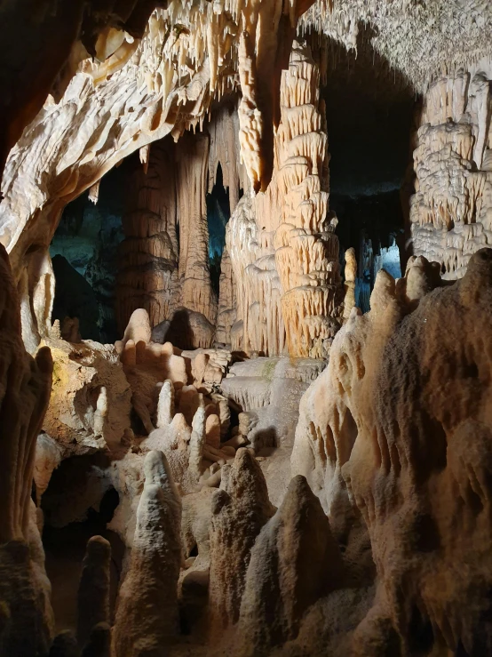 the caves are carved of rock and have light coming in from them