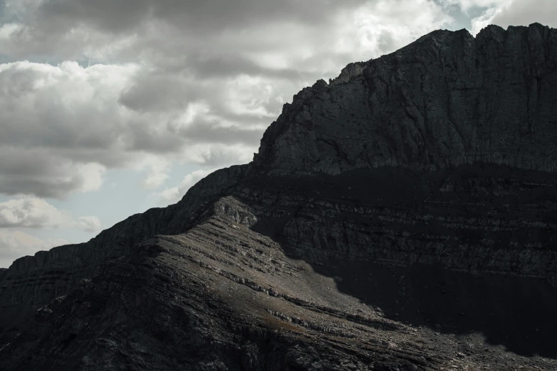 a black and white po of a large cliff