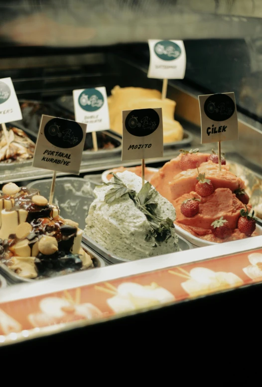 a bunch of food that is on display in a case