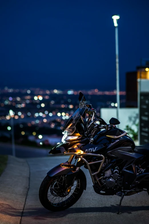 three motorcycles are lined up against the wall